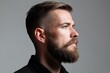 © Mrammon - A man with a beard and a shaved head