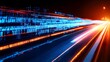© indasah - Blurred highway at night with digital code streaking across