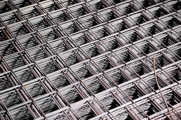 Stacked welded wire mesh in cold plant storehouse macro view