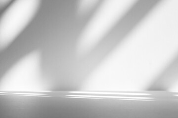 Fototapete - Wall interior background, studio and backdrops show products.with shadow from window color white and grey. background for text insertion and presentation product	

