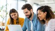 © Jo - Engaged Professionals Working as Team in Bright Coworking Space