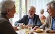 © zhao - Group of cheerful senior people enjoy in conversation during lunch at nursing home. High quality