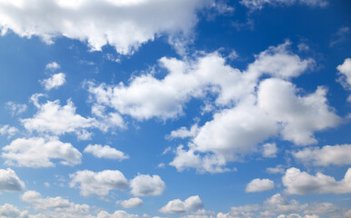 Wall Mural - a beautiful blue sky with soft, white clouds, for an abstract background