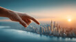 © Rohan Katwe - A giant hand points towards a miniature cityscape at sunset, creating a surreal and awe-inspiring scene.  The city is bathed in warm light, contrasting with the cool tones of the hand and sky.