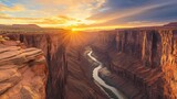 Grand canyon vista with river winding through the canyon at sunset with dramatic lighting effect