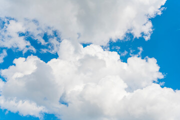 Wall Mural - Beautiful view of blue sky with clouds at sunrise. Sky clouds background. Partly cloudy. Background cloud summer. Sky cloud clear with sunset. Natural sky