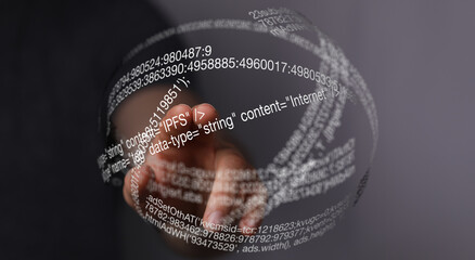 Fototapete - Abstract image of a hand interacting with a sphere of code, representing data and technology.