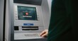 © Framestock - ATM User Entering PIN Code on ATM Keypad for Money Withdrawal. Error Message on Cash Machine Screen About Cancelled Transaction Due to Blocked Card. Cash Transactions, Banking System. Close Up Shot.