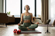 © Maria Vitkovska - Fitness influencer practicing yoga and meditation at home with headphones and smartphone