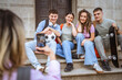 © Miljan Živković - high school classmates pose for photo while the girl is take pictures