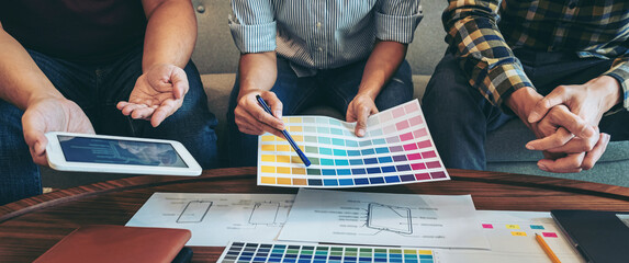 Wall Mural - professional creative team of web/graphic designer planning, drawing website ux app for mobile phone