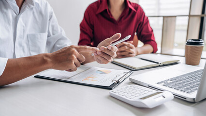 Fototapete - Teamwork of business casual colleagues, consultation new strategy plan business and market growth on financial document graph report, conference to making growth profit, Partner meetings and briefing