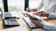 © Freedomz - Business team are working with leader, Presentation to colleagues and business strategy and having a discussion, pointing to the graph and chart, success of cooperation partnership