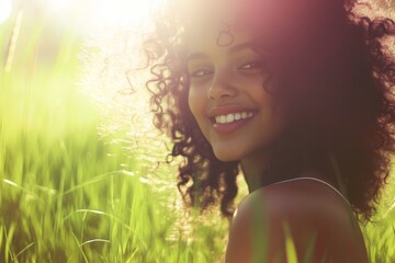 young woman enjoys sunny afternoon in a grassy field, showcasing her natural beauty and joyful smile