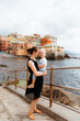 © Doralin - Mother holding her son in boccadasse, genova, italy