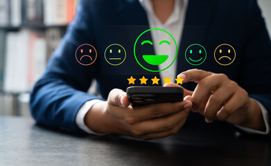 Canvas Print - customer using tablet give five star rating, submit satisfaction survey through online application. 