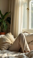 Wall Mural - Cozy indoor scene featuring comfortable pants, soft lighting, and relaxing atmosphere Perfect for lifestyle, home, comfort, and fashion blogs and websites , natural light, apparel, hygge