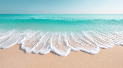 Wall Mural - A serene view of gentle waves washing onto a sandy beach. The turquoise water blends beautifully with the sky, creating a peaceful atmosphere perfect for relaxation and escape.