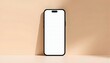 © World Images - Blank smartphone mockup beige background, Empty screen with shadow, Mobile device with simple backdrop