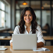 © Ratna - Smiling latin hispanic female marketing manager