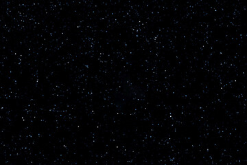 Wall Mural - Starry night sky. Dark blue galaxy space background. Glowing stars in space. New Year, Christmas and Celebration background concept.