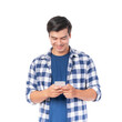 © suphaporn - Happy young Asian man using smartphone while smiling, wearing casual blue checkered shirt, standing and holding phone isolated on a transparent background, communication and technology concept