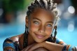 © MirucsArt - Charming girl with cornrows and blue eyes rests by a swimming pool in Summer