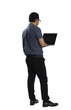 © jamesteoh.art - Businessman standing and typing on laptop with transparent background