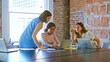 © Monkey Business - Multi-Cultural Group Of Businesswomen Working Together In Boardroom