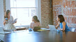 © Monkey Business - Multi-Cultural Group Of Businesswomen Working Together In Boardroom