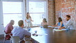 © Monkey Business - Businesswoman Standing To Address Colleagues At Boardroom Meeting
