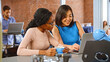 © Monkey Business - Two Businesswomen Have Informal Meeting In Office Coffee Bar