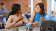 © Monkey Business - Two Businesswomen Have Informal Meeting In Office Coffee Bar