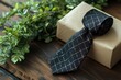 © Khadija - Elegant gift with patterned tie crafted box and greenery for the on transparent background