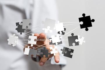 Aufkleber - Abstract image of puzzle pieces interconnected, symbolizing teamwork, collaboration, and problem-solving.
