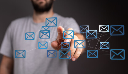 Leinwandbilder - Image depicts a person interacting with a network of email icons, symbolizing digital communication and email management.