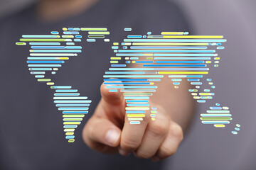 Leinwandbilder - Hand interacting with a digital world map, representing global connectivity and networking.