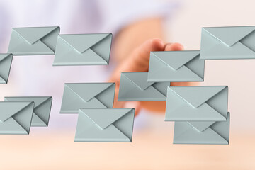 Leinwandbilder - Hand interacting with floating email icons. Digital communication, inbox management.