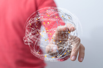 Leinwandbilder - Abstract image of a hand interacting with a digital globe representing internet connectivity and data.