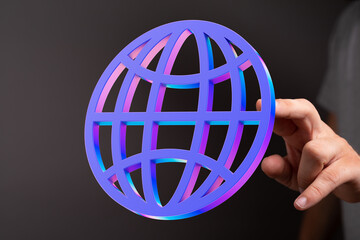 Poster - Hand holding a vibrant 3D globe icon. Represents internet, global network, or worldwide connection.