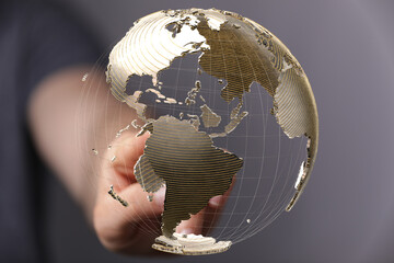 Leinwandbilder - Abstract image of a hand interacting with a 3D model of the Earth, symbolizing global connectivity and networking.