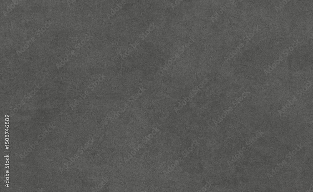 A dark gray textured background with subtle variations in shade and ...