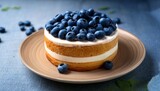 delicious cake topped with fresh blueberries perfect for dessert or a sweet treat