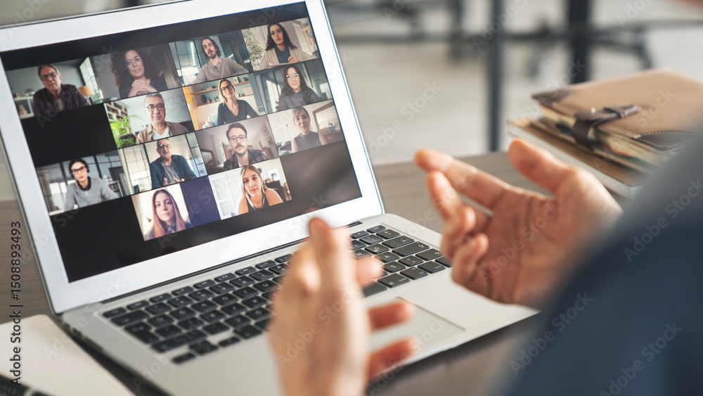 Working and talking on the computer with video calling Stock Photo ...