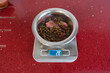 © ADDICTIVE STOCK - Dog food portion on digital kitchen scale