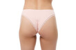 © New Africa - Woman wearing beautiful underwear on white background, closeup