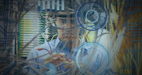 Round scanners and microprocessor connections against caucasian male engineer working