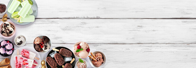 Aufkleber - Cool summer food corner border. Assortment of ice cream bowls, popsicles and frozen treats. Overhead view on a white wood banner background. Copy space.
