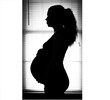 © Ana - Elegant silhouette of pregnant woman, black and white maternity portrait, beautiful pregnancy profile, expectant mother moment, serene maternity photography, intimate motherhood celebration.
