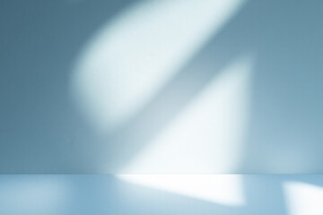 Poster - Wall interior background, studio and backdrops show products. with soft light shadow from window color blue and white. background for text insertion and presentation of product	